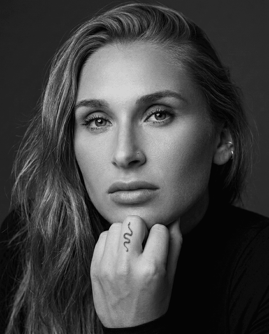 Black and white portrait of Summer Loffler with a direct, composed expression.